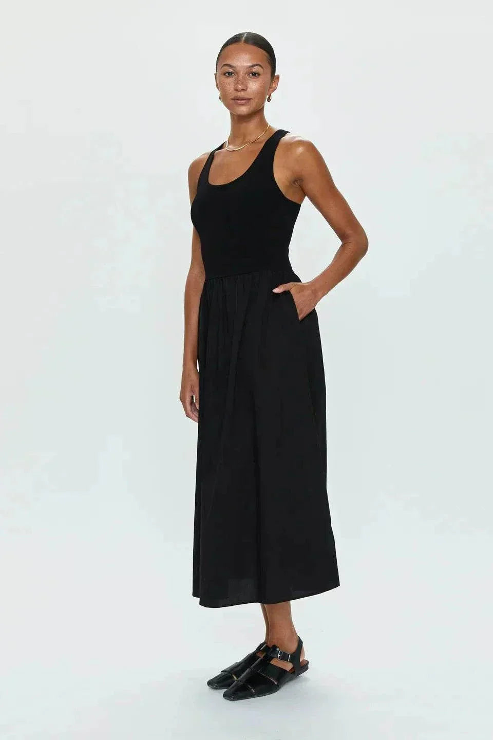 Black Faye Tank Dress with sleeveless design and relaxed skirt silhouette