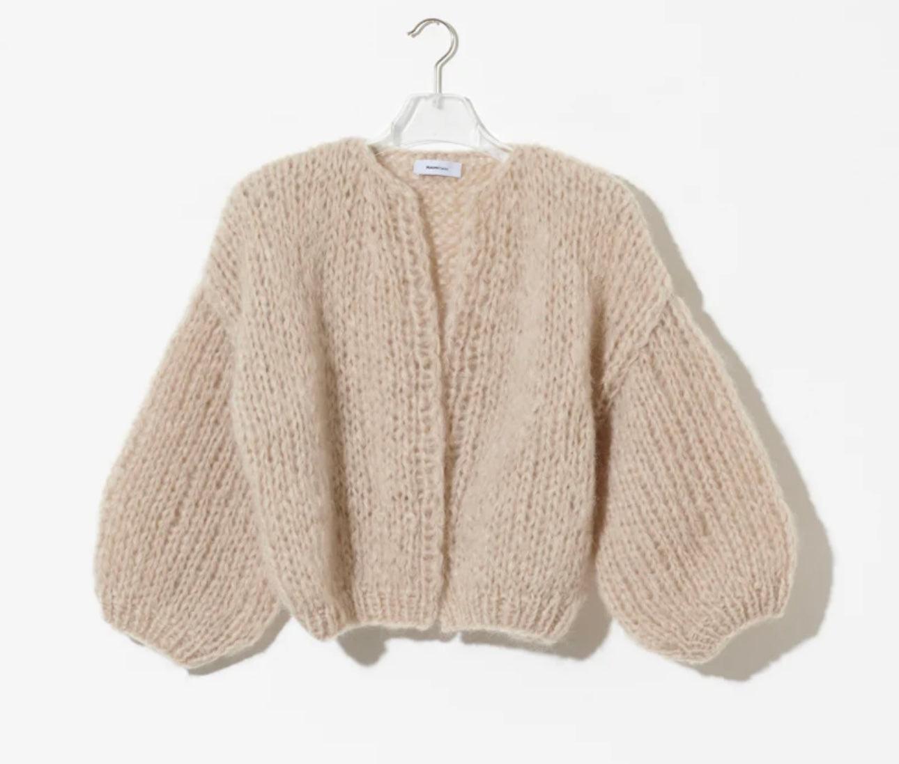 Beige boucle oversized cardi with cropped sleeves and puffed arms made of mohair and wool by MAIAMI Berlin