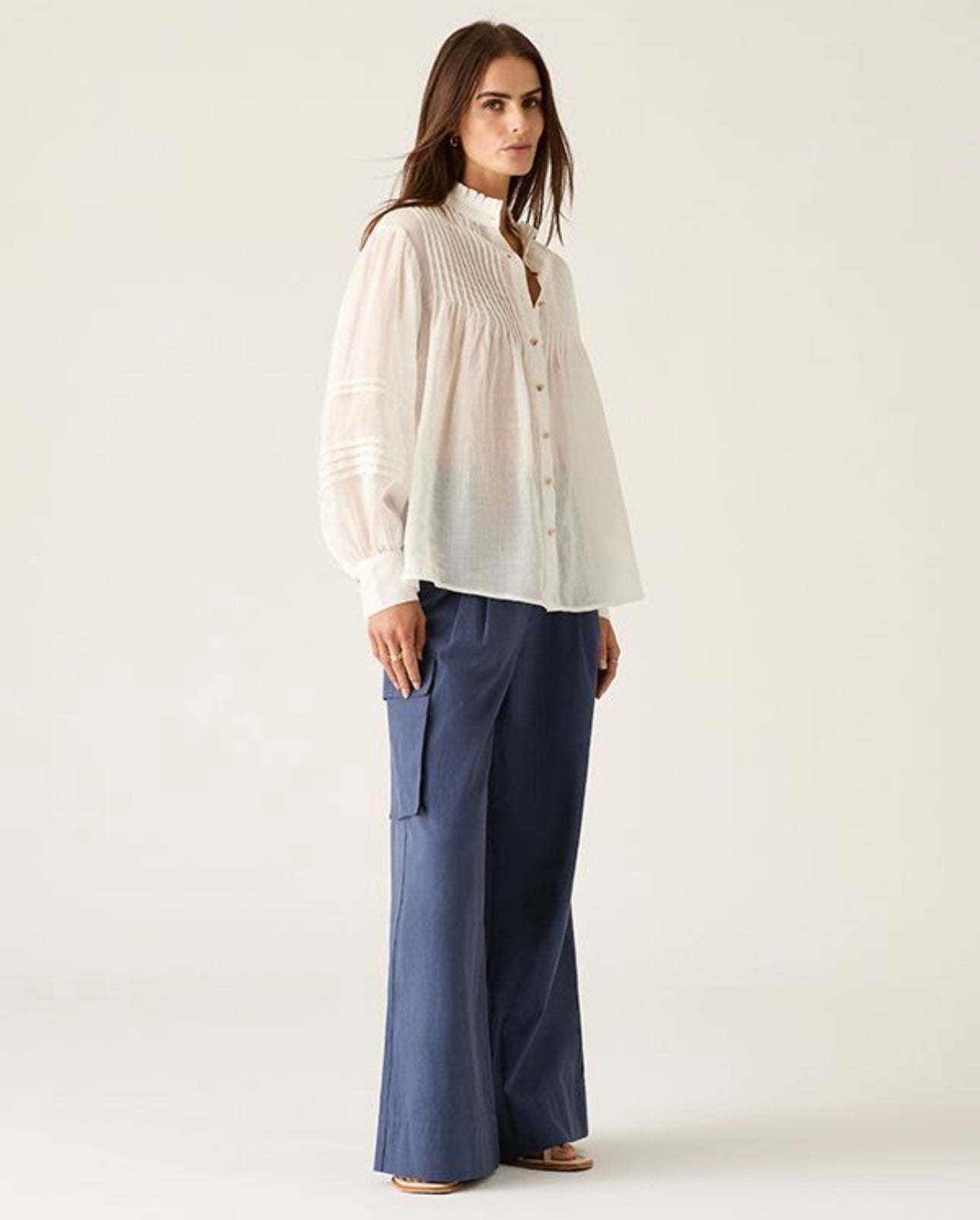 Aaliyah Blouse ivory lightweight semi-sheer pleated shoulder blouse with blouson sleeves and gold button front