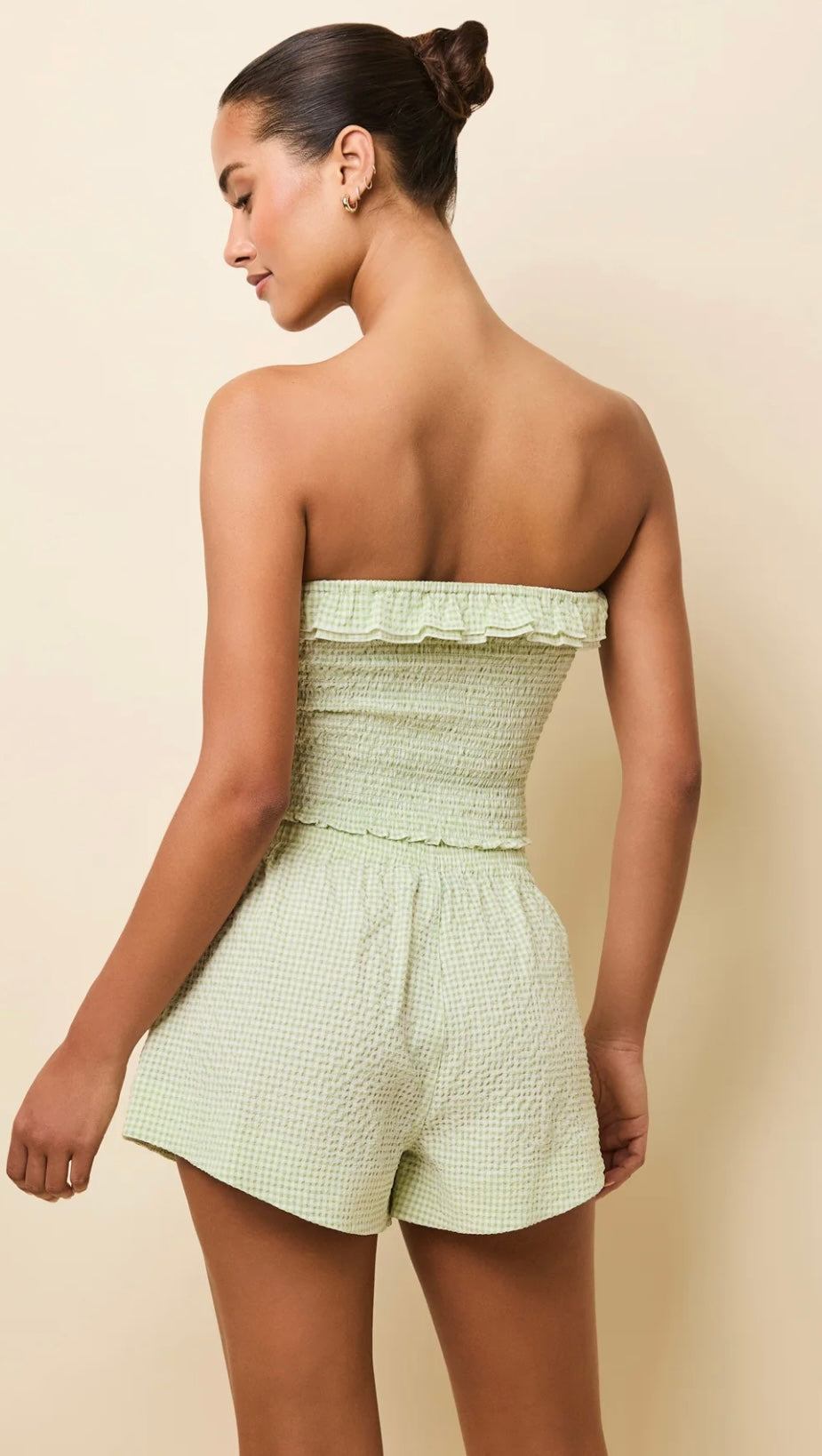 The Vicky Shorts in green matcha gingham seersucker fabric with elastic waistband and wide leg openings