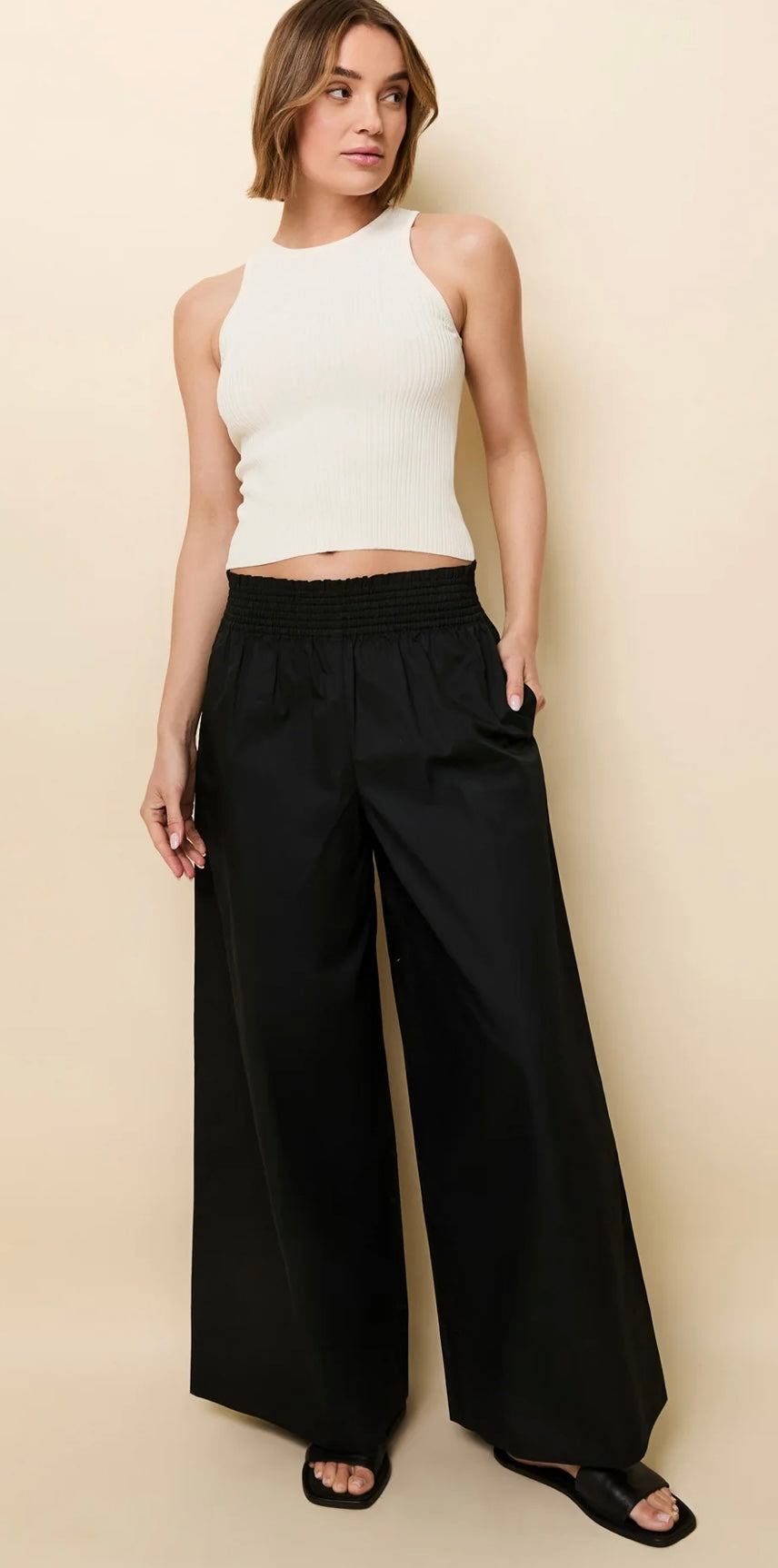 The Twyla Pant Noir by SOLID&STRIPED high-waisted black palazzo pants with elastic waist and light cotton fabric