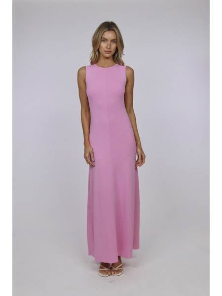 The Lucerne Bonbon sleeveless pink maxi dress by SOLID&STRIPED modeled by a woman