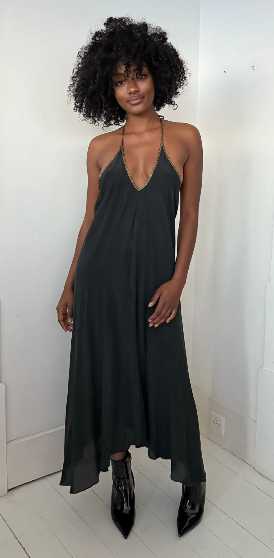 Elegant Rhodes Dress in pure black with high-low hemline by HANSINE LONDON, crafted from Italian fabric.