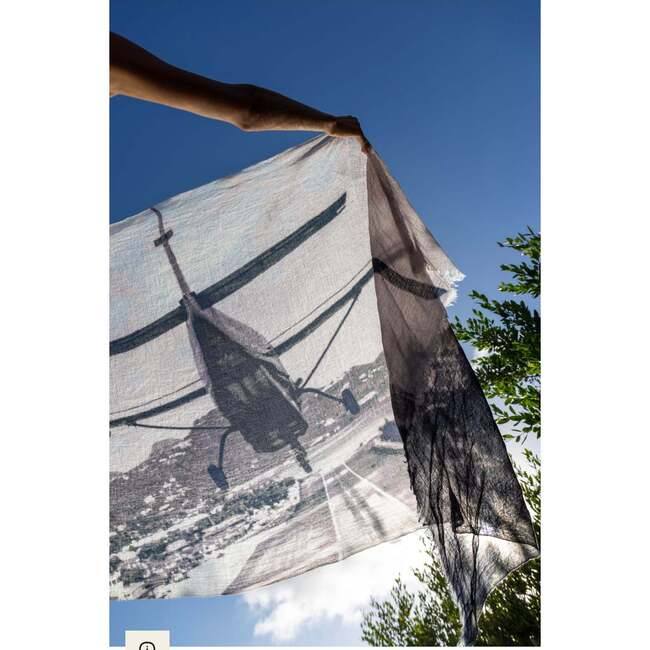 Cashmere St Barth Landing scarf with helicopter print on lightweight fabric against blue sky