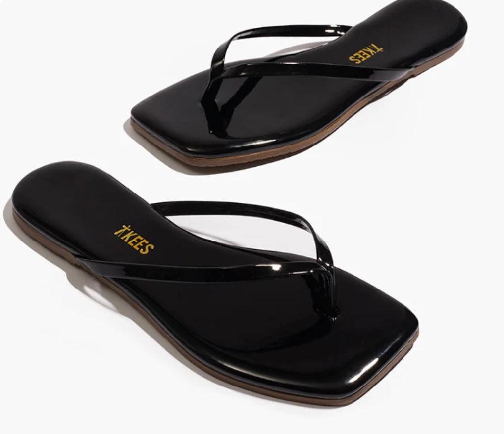 Lily Squares Licorice TKEES black glossy square-toe flip flops with minimalist design