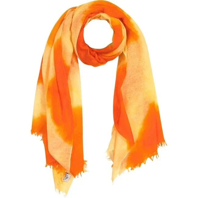 Cashmere dip dye shawl in fiery sunset colors, hand-felted and hand-dyed from Nepal, versatile beach-to-table wrap.