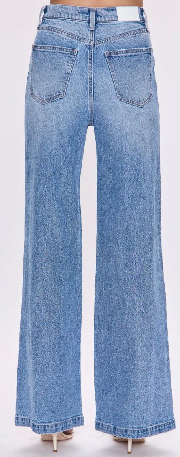 The Lana Wide Leg Pistola denim jeans in light wash with high-rise waist and relaxed wide leg silhouette