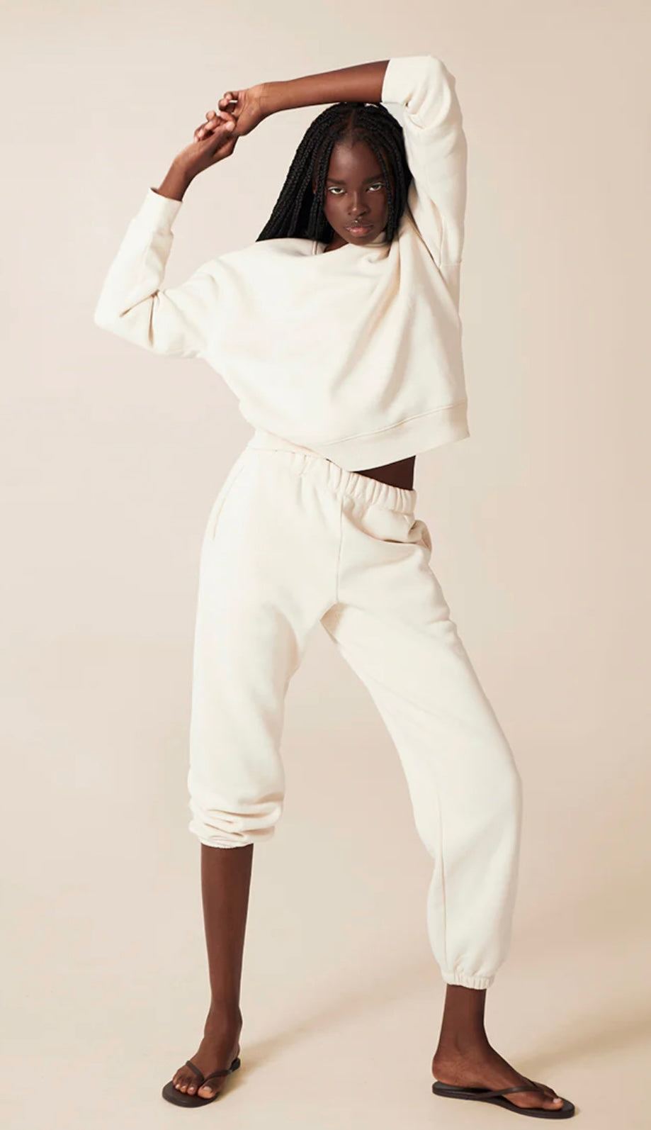 Model wearing Air Whipped Crew & pants set in bone color by TKEES