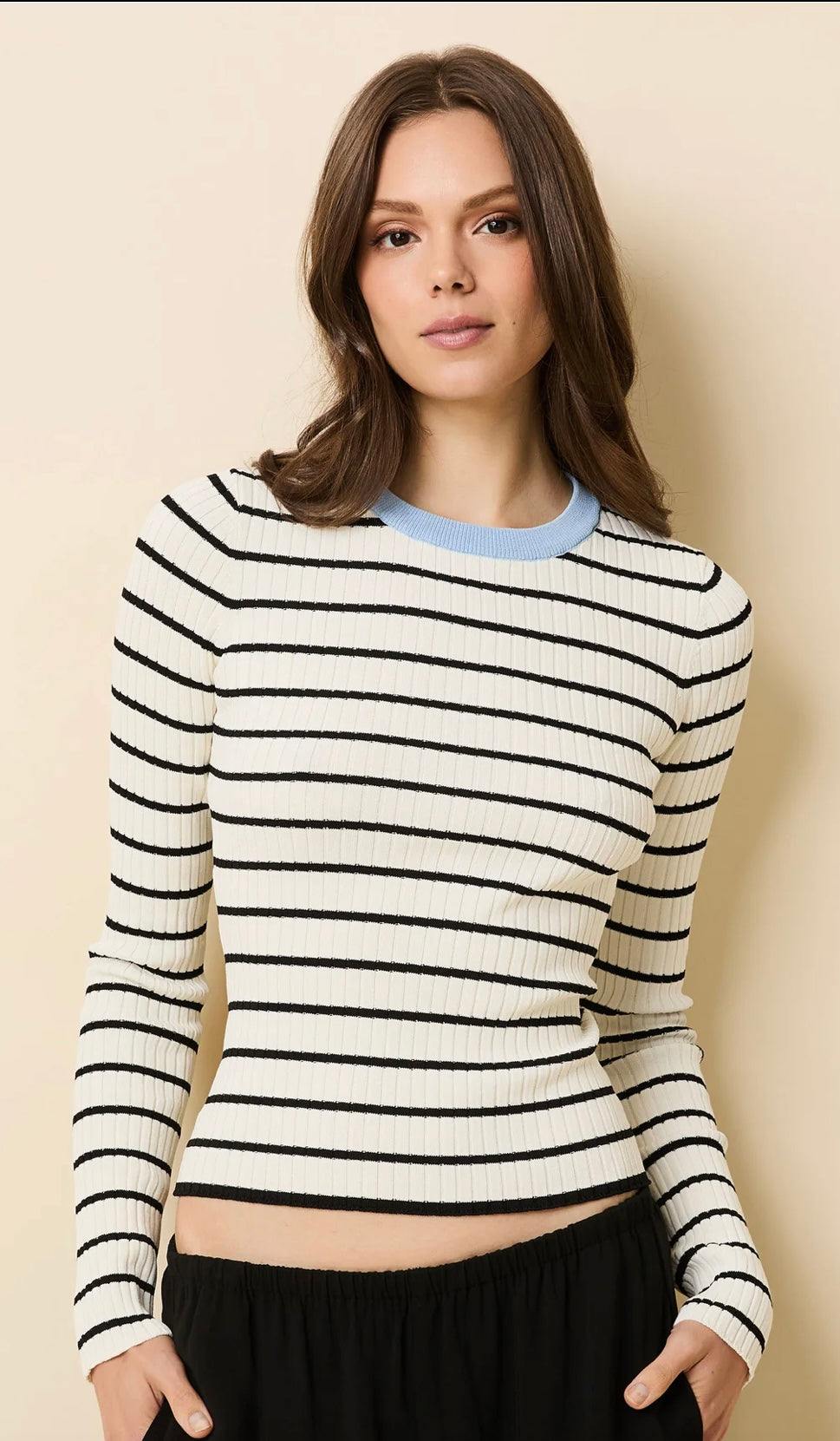 Woman wearing The Dora Top Brulé by SOLID&STRIPED with ribbed knit and classic stripes