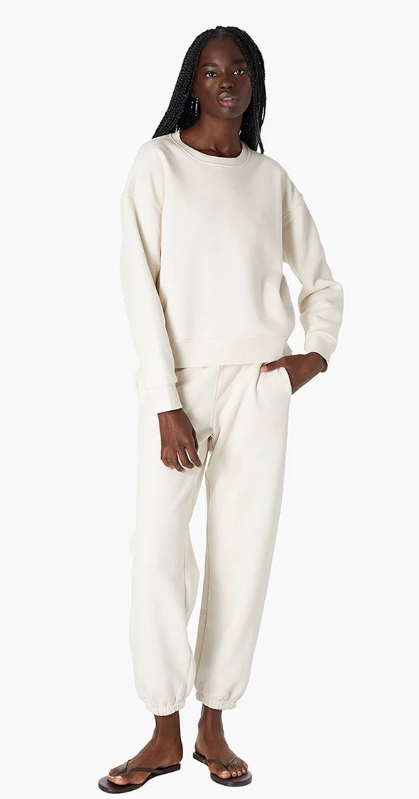 Woman wearing Air Whipped Crew & Pants Set Bone TKEES in cream color