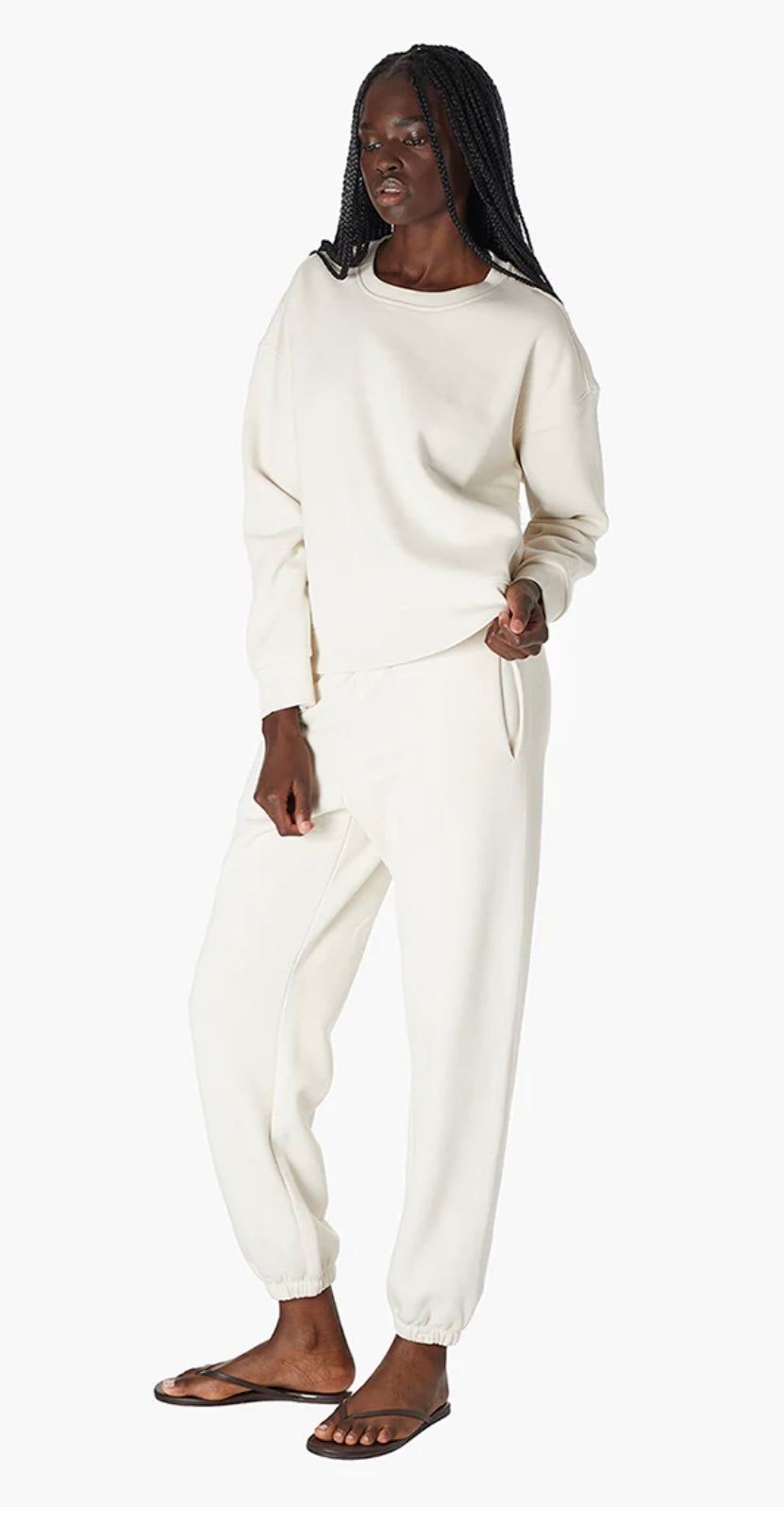 Woman wearing bone-colored Air Whipped Crew & Pants set by TKEES