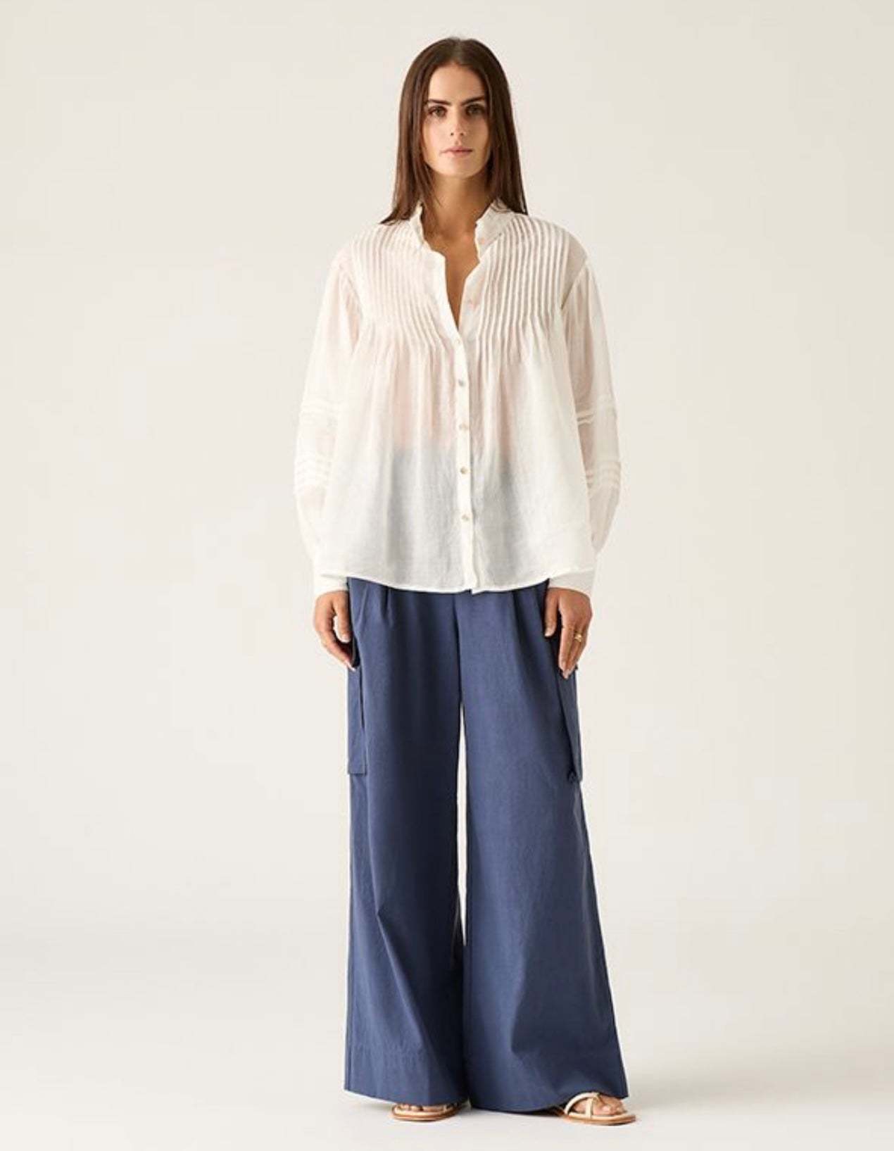 Aaliyah Blouse ivory lightweight pleated blouse with blouson sleeves and gold buttons