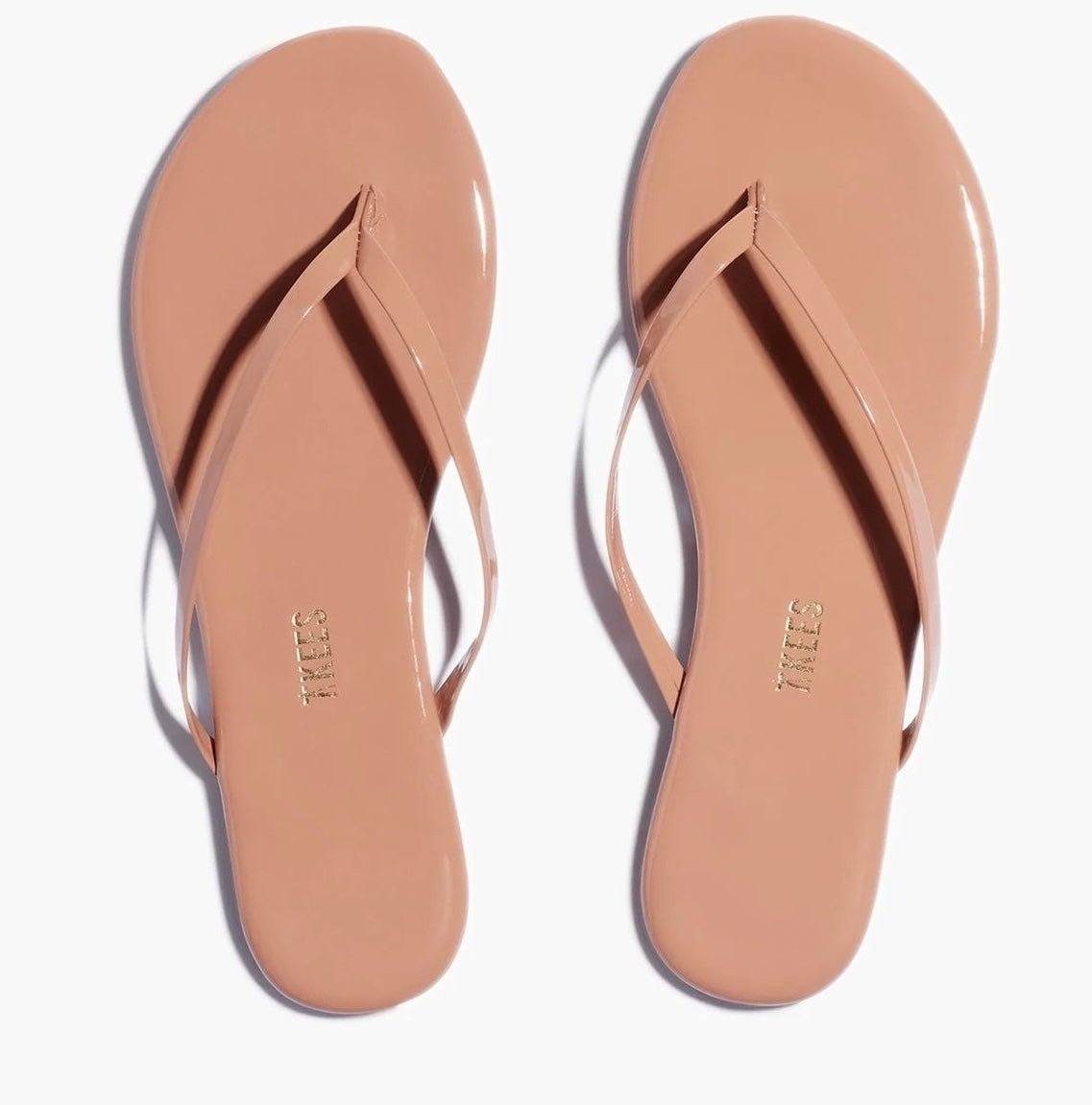 Foundation Gloss Cocoabutter TKEES glossy patent leather flip flop sandals with cushioned insole and rubber outsole