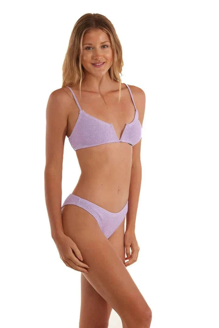 woman wearing lilac Ibiza Lilac LOVE&BIKINIS bikini with adjustable straps and v-neck embellishment
