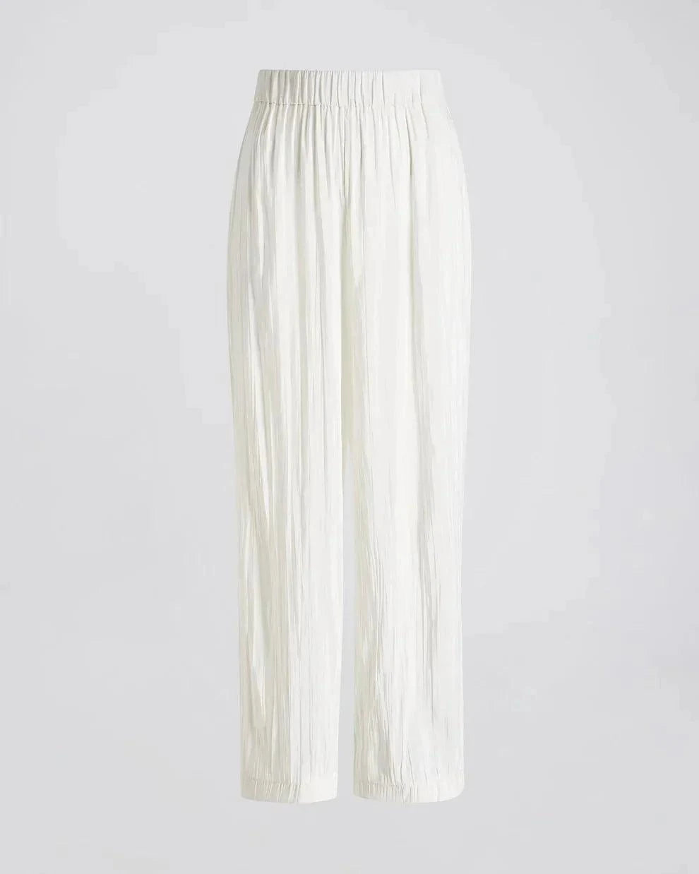 The Milly Pant in ecru with lightweight crinkle fabric, relaxed fit, high waist, and raw hem
